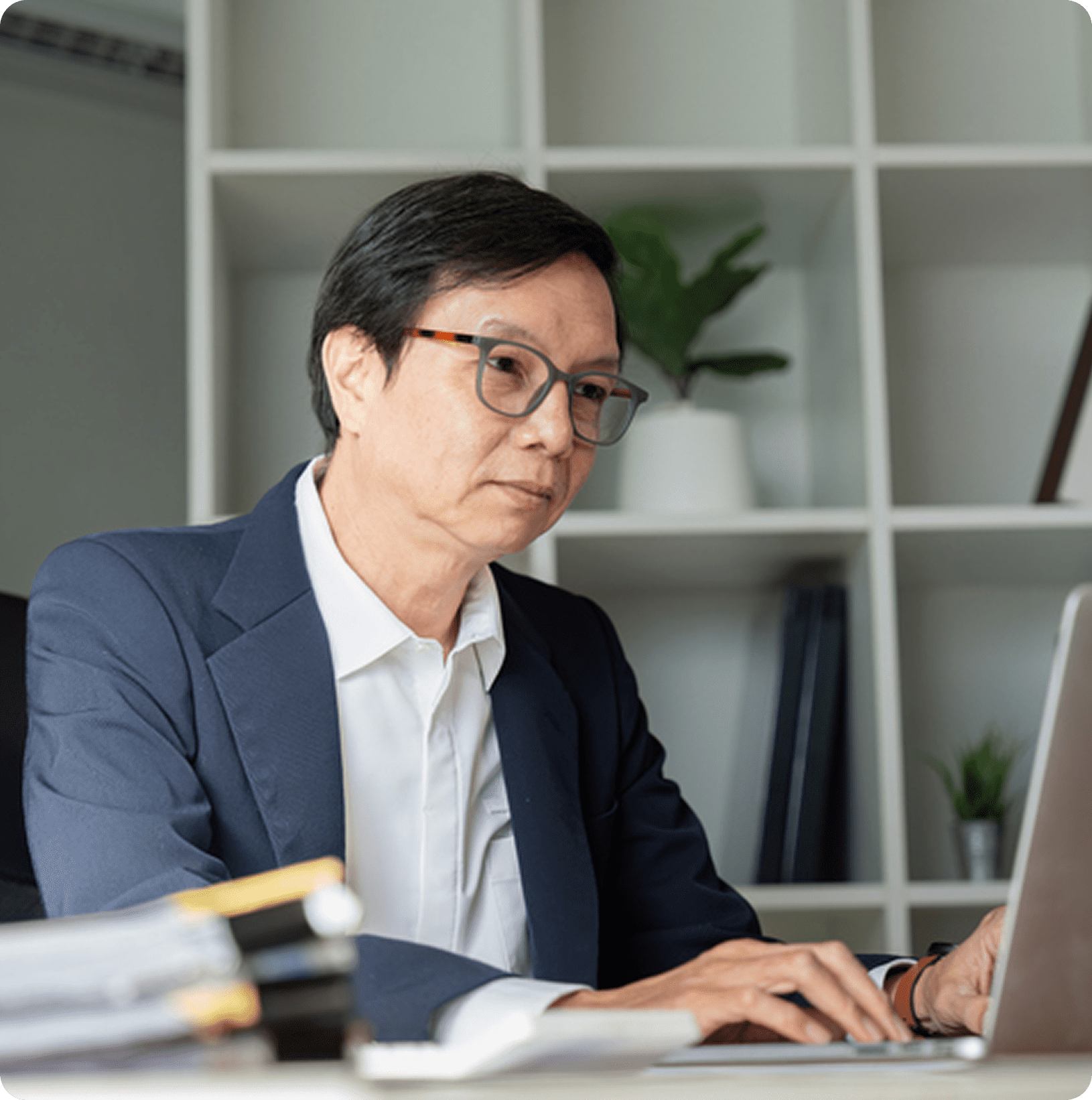 Man working on laptop in office